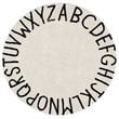 Lorena Canals ABC Washable Rug in Natural and Black, Hand-Tufted, features bold alphabet design on a soft, cozy backdrop.