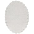 Lorena Canals Cotton Woods Pinecone washable rug in ivory and natural hues, hand-tufted design showcased in a cozy setting.