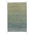 Lorena Canals Twin Reversible Washable rug in vintage blue, olive, and natural hues, hand-tufted with intricate patterns.