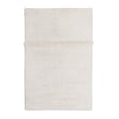 Lorena Canals Woolable Sheep of the World Tundra rug, hand-tufted in white, displayed on a soft gray backdrop for elegant decor.