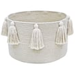 Hand-made Lorena Canals New Tassels Basket in natural color, showcased on a hardwood floor setting, perfect for stylish storage.