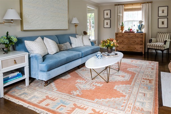 Contrast your living room colors using a combination of rugs and furniture