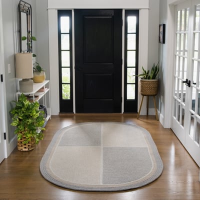 Manaia Smoked Sand Wool Braided Area Rug