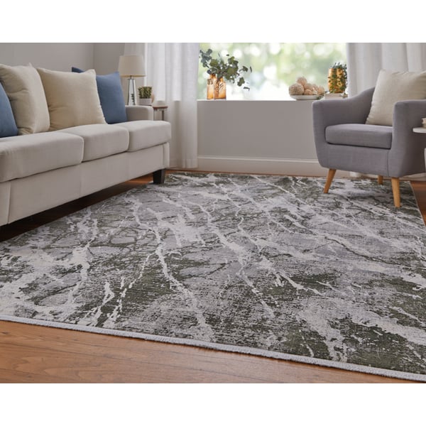 Elegant Feizy Rugs Cadiz 86639N6F in green and ivory showcasing intricate patterns, perfect for enhancing living room aesthetics.